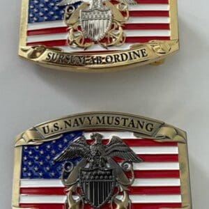 Two american flag belt buckles with a gold eagle and the words " united states marine corps " on them.