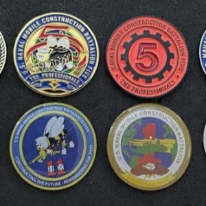 A group of eight different colored coins.